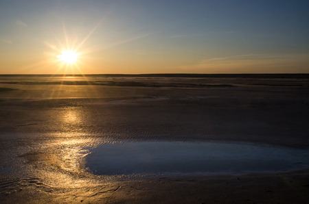 Sunset on the salt lake in the steppe. Lake Elton, Volgograd Region, Russia.の写真素材