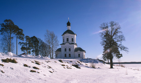 Monastery Nile Hermitage, one of the towers, illuminated by the sun. Tver region, Russia.の写真素材
