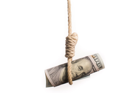 devaluating money hanging on the ropeの写真素材
