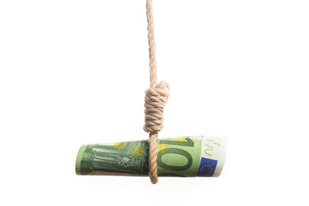 devaluating money hanging on the ropeの写真素材