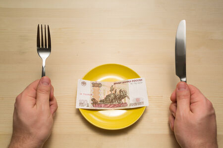 Plate with hundred rubles copyspaceの写真素材