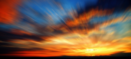 Blurred Sunset with cloudsの写真素材