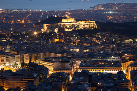 Illuminated Acropolis in Athens, Greece at duskの写真素材