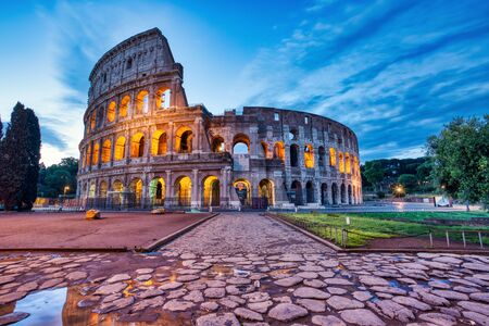 Illuminated Colosseum at Dusk, Rome, Italyの写真素材