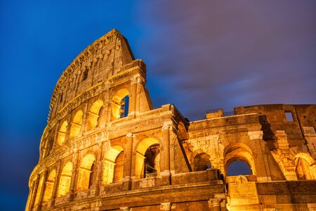 Illuminated Colosseum at Dusk, Rome, Italyの写真素材