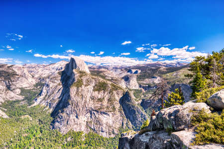 Yosemite Valley with Half Dome during a Sunny Day, View from Glacier Point, Yosemite National Park, Californiaの写真素材