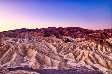 Badlands view from Zabriskie Point in Death Valley National Park at Sunset, Californiaの写真素材