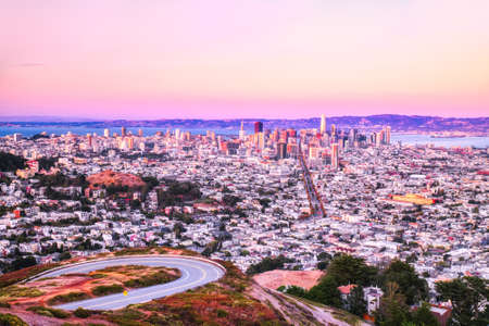 San Francisco Skyline View from Twin Peaks with Vivid Warm Sky Colors, California, USAの写真素材