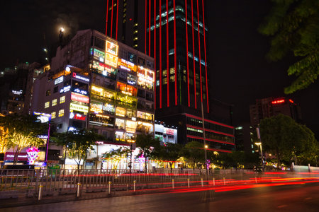 Famous Coffee Shop Building on Nguyen Hue Walking Street in Ho Chi Minh City Street at Dusk, Vietnam
