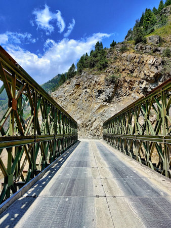 The old railway bridge over the gorge in the mountains of the Caucasus