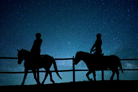 horse riding in the universeの写真素材