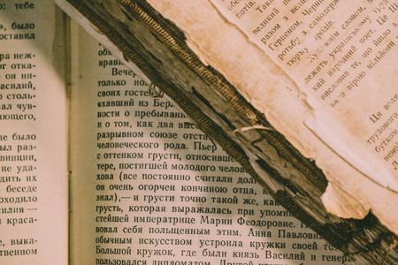 vintage books on the tableの写真素材