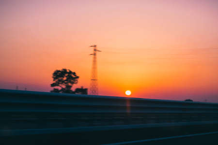 a beautifull sunset on a highwayの写真素材