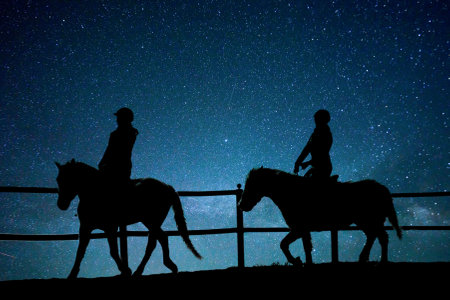 horse riding in the universeの写真素材