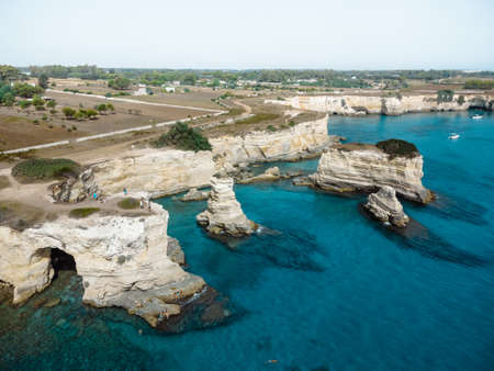 a great view on stacks of sant'andrea in pugliaの写真素材