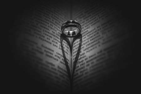 a heart made with book and ringの写真素材