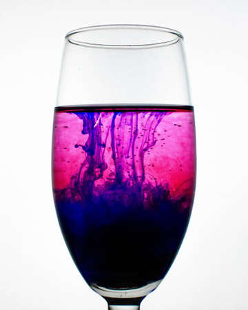a fantastic wallpaper of ink in glassの写真素材