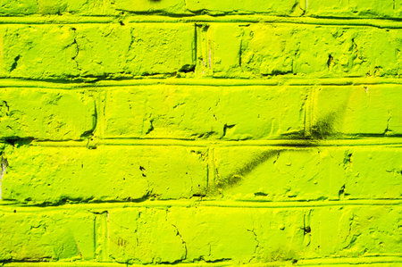 Brick wall with bright graffityの写真素材