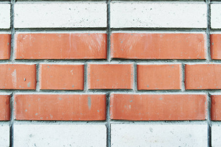 texture of wall from a new red and white brick