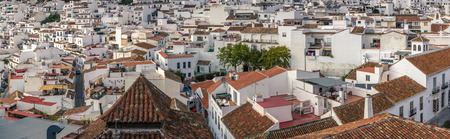 Top view of the town of Mijas. White houses with red tile roofs. The southern coast of Spain.の写真素材