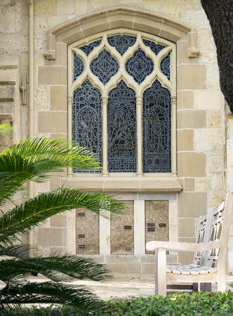 colorful windows and window boxes planters displays adornments enhance architecture in southern USAの写真素材