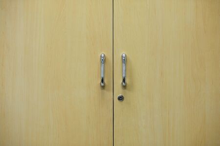 Wood door with chrome silver handles setの写真素材