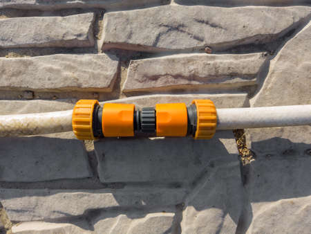 Coupling of water supply hoses using a plastic couplingの写真素材