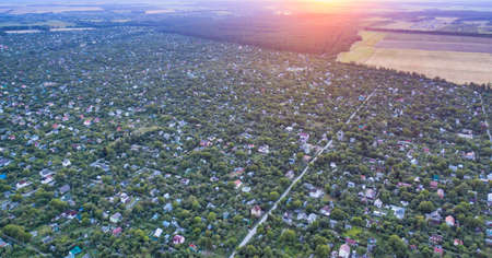 Plenty of private homes and homes in the green zone with small-density development - aerial shotの写真素材