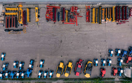 Tractors, cultivators and other agricultural equipment in stock - top view. Copy space.の写真素材