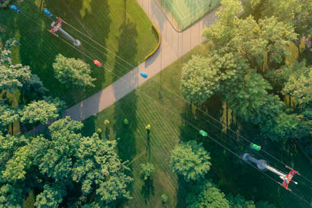 Morning in summer park with paths and cable car, top viewの写真素材