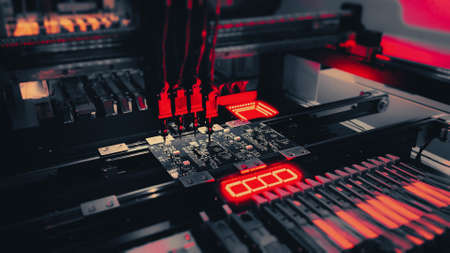 SMT manufacturing of computer chips by SMT Pick and Place machineの写真素材