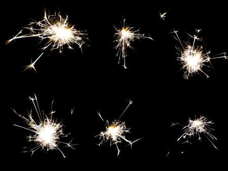 Set of 6 birthday Sparklers isolated on black backgroundの写真素材