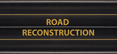 Road Reconstruction sign against background of new asphalt multi-lane highwayの写真素材