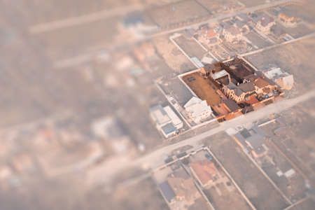 Plot with a house on a translucent blurred overlay - aerial viewの写真素材