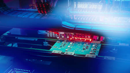 Automatic production of computer chips by SMT Pick and Place machine with Machine Vision Systemの写真素材
