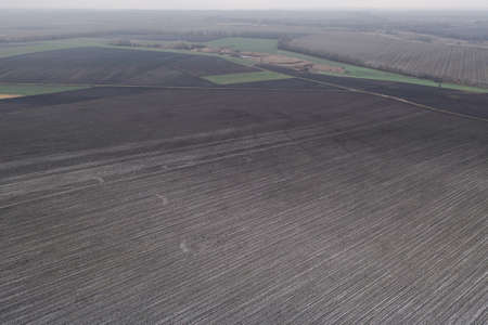 Aerial Drone shot of agricultural land plots for Farming. Agro land for agribusiness.の写真素材
