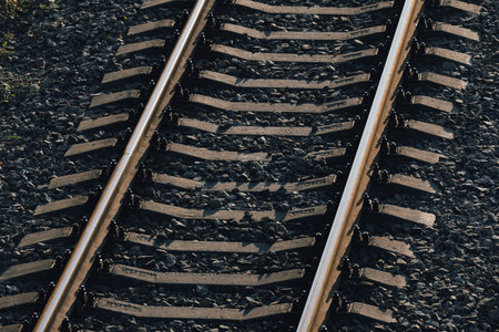 An Overhead View of Railroad Tracks Providing a Unique Perspective on Transportation Systemsの写真素材