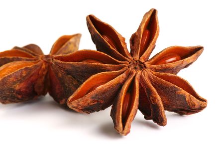 Close up of anise star in isolated white backgroundの写真素材