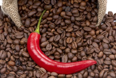 Coffee beans and red chilli peppers. Macroの写真素材