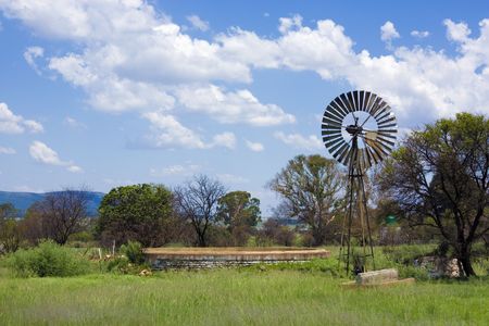 Wind pump on farmの写真素材