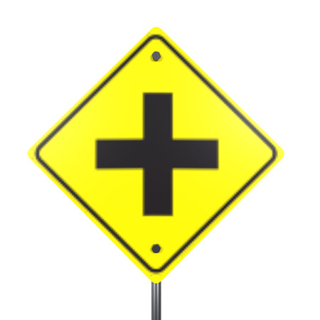 A bright yellow traffic sign displays a bold black cross shape, indicating caution.の写真素材