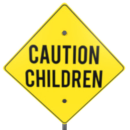 A bright yellow sign warns drivers of children nearby, enhancing safety.の写真素材