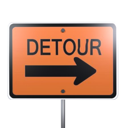 A bright orange detour sign with a right arrow directs road users away from their usual path.の写真素材