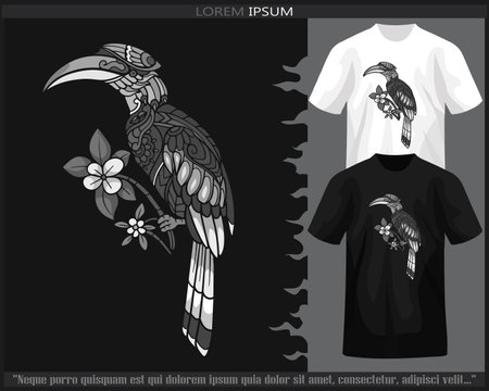 Monochrome hornbill mandala arts isolated on black and white t shirt.のイラスト素材