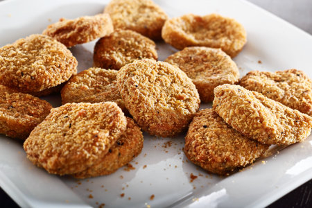 plate full of crispy chicken nuggets
