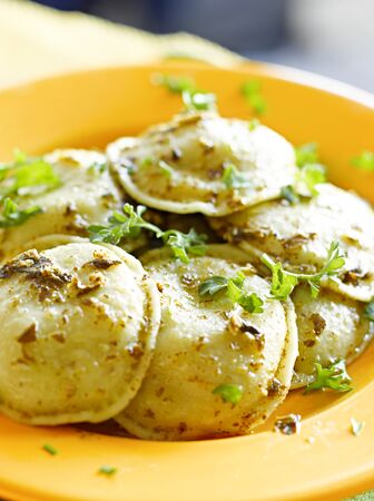 Ravioli pasta with basil pestoの写真素材