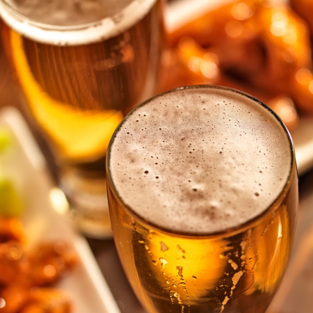beer and wings at celebrationの写真素材