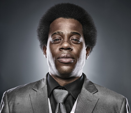 african business man portrait on grey backgroundの写真素材