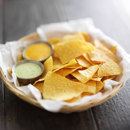 mexican corn tortilla chips with jalapeno and chipotle mayo dipping sauceの写真素材