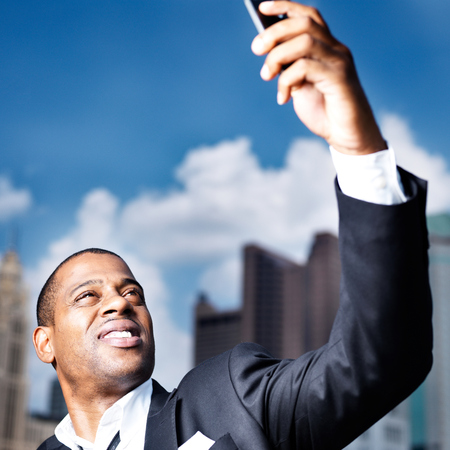 african businessman taking selfieの写真素材